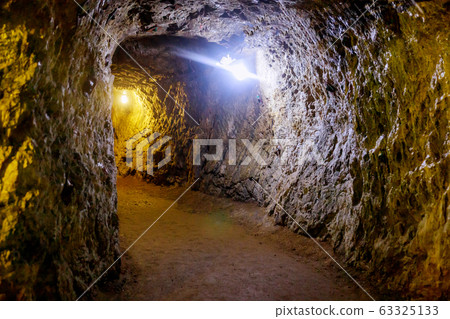Underground mine passage with light 63325133