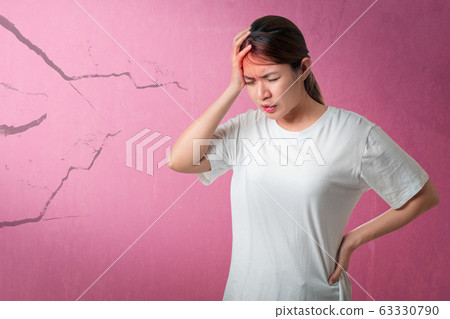 Asian woman wear white t-shirt feelling sick have 63330790