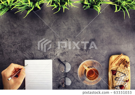 Sweet dessert with waffles and berries for tea at work. 63331033