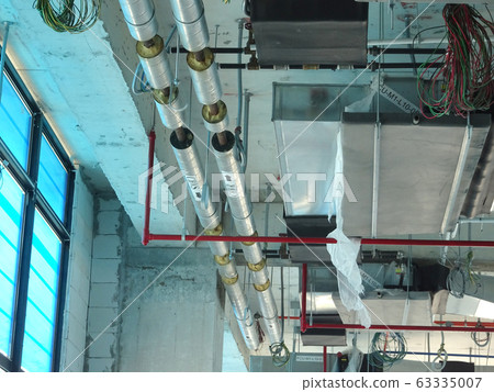 Installation of air conditioner ducting and chiller pipes system and hung it at the concrete slab. Installed and coordinated together with other services.  63335007