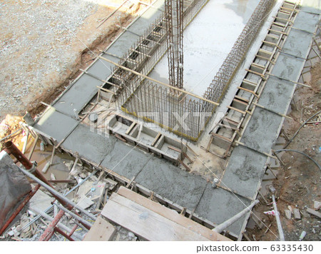 Wet concrete is allowed to harden in wooden form work as the mold. Timber form work will be dismantle after the concrete hardened.  63335430