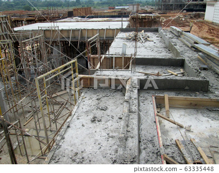 Wet concrete is allowed to harden in wooden form work as the mold. Timber form work will be dismantle after the concrete hardened.  63335448