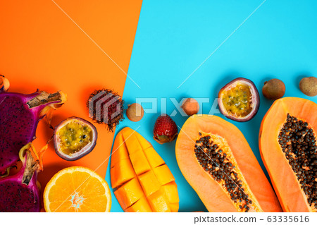 Exotic fruits on colored background 63335616