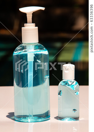 People's hands using wash hand sanitizer gel pump dispenser with alcohol gel sanitizer on black, Close up&Macro shot, Select focus, Prevention from covid19, Bacteria, Healthcare, 7 step wash hand People's hands using wash hand sanitizer gel pump dispenser with alcohol gel sanitizer on black, Close up&Macro shot, Select focus, Prevention from covid19, Bacteria, Healthcare, 7 step wash hand 63336396