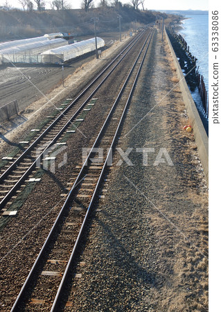 Photograph of JR Kitahunaoka Station in Date City, Hokkaido in early spring 63338086
