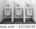 urinals sanitary in toilet room 63338338