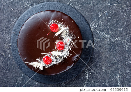 Chocolate and cherry cake with cherry pie filling 63339615