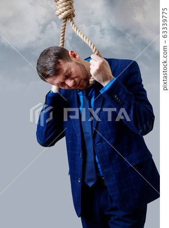 Businessmen pulling rope, close-up stock photo