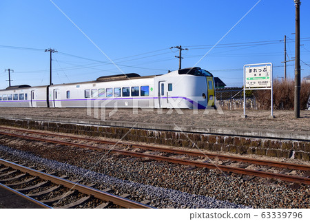 Take a picture of the scenery of the limited express Hokuto passing through JR Kifu Station in Date City, Hokkaido in early spring Take a picture of the scenery of the limited express Hokuto passing through JR Kifu Station in Date City, Hokkaido in early spring 63339796