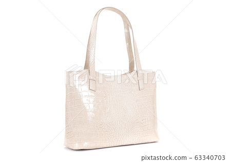 women cream leather bag isolated on white background 63340703