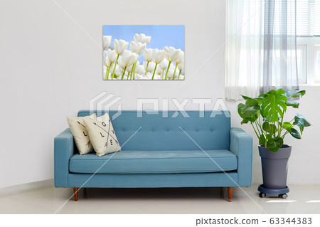 Interior scene with blue sofa and picture frame, Interior scene with blue sofa and picture frame, 63344383