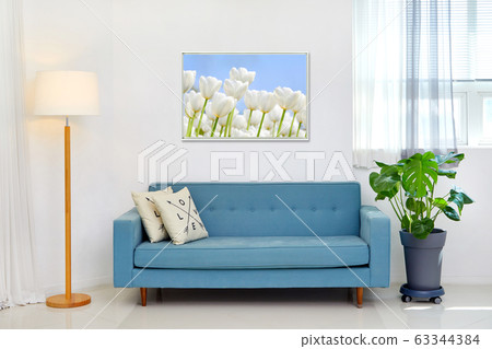 Interior scene with blue sofa and picture frame, Interior scene with blue sofa and picture frame, 63344384