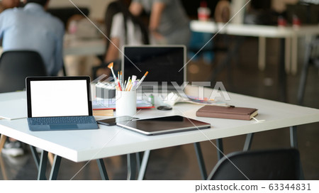 Cropped shot of Tablet, laptop and stationary Cropped shot of Tablet, laptop and stationary 63344831