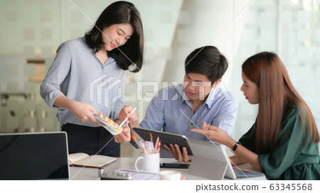 Cropped shot of young designer team working on 63345568