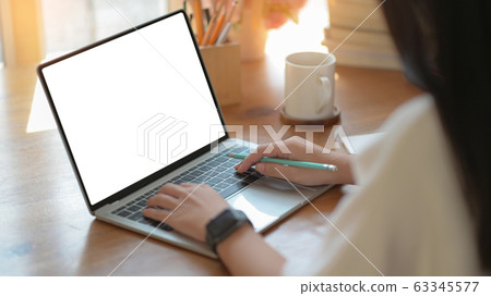 Young business women are using blank screen laptop 63345577