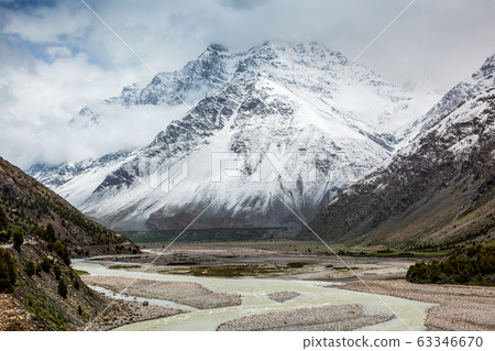 Lahaul valley in Himalayas with snowcappeped mountains. Himachal Pradesh, India Lahaul valley in Himalayas with snowcappeped mountains. Himachal Pradesh, India 63346670