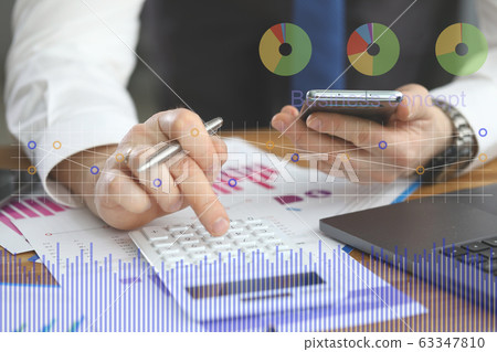 Male hand holding cellphone using some mobile business application Male hand holding cellphone using some mobile business application 63347810