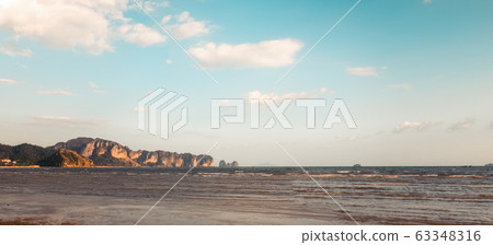 Blue sea and rocky mountains, evening bay in Krabi 63348316