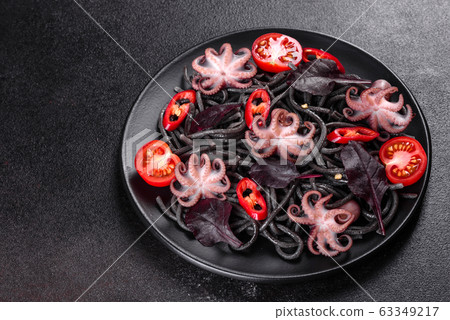 Black seafood pasta with shrimp and octopus Black seafood pasta with shrimp and octopus 63349217