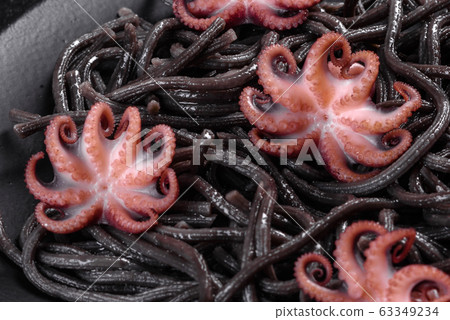Black seafood pasta with shrimp and octopus 63349234