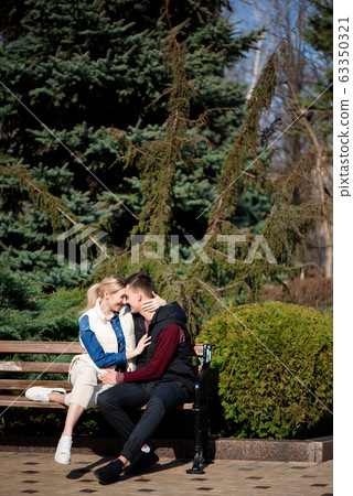 Man and woman wearing protective mask against transmissible infectious diseases  63350321