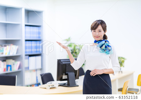 Young woman, receptionist, check in 63352118