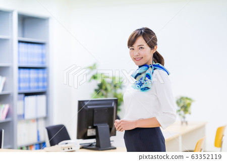 Young woman, receptionist, check in 63352119