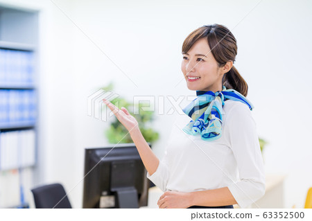 Young woman, receptionist, check in 63352500