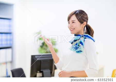 Young woman, receptionist, check in 63352501