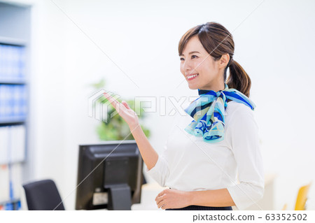 Young woman, receptionist, check in 63352502