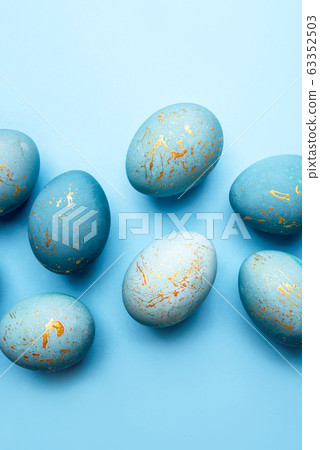 Easter background of eggs painted in blue color. Easter background of eggs painted in blue color. 63352503