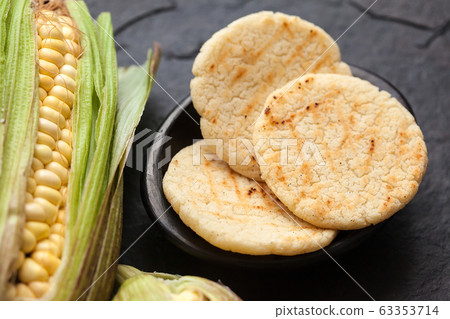 Roasted traditional South American corn arepa 63353714