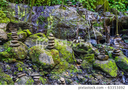 View on stone tower on mountain river on Bali, View on stone tower on mountain river on Bali, 63353892