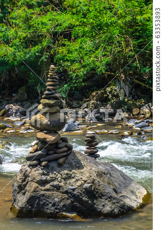 View on stone tower on mountain river on Bali, View on stone tower on mountain river on Bali, 63353893