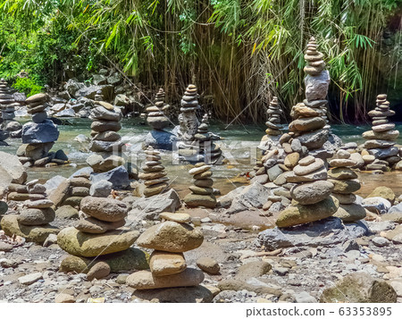 View on stone tower on mountain river on Bali, 63353895
