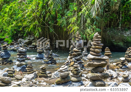 View on stone tower on mountain river on Bali, 63353897