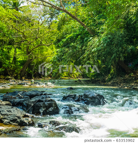 View on mountain river on Tegenungan waterfall on 63353902