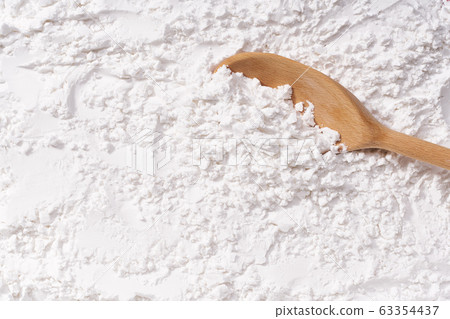 Background of corn starch flour powder texture Background of corn starch flour powder texture 63354437