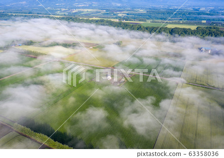 Aerial view of foggy day Aerial view of foggy day 63358036