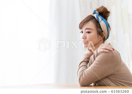 Woman in room wear Woman in room wear 63363269