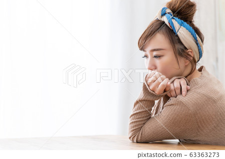 Woman in room wear 63363273