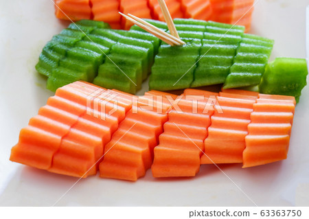 Papaya slice and thai cantaloupe fruit on plate on 63363750