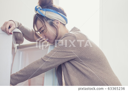 Woman in room wear Woman in room wear 63365236