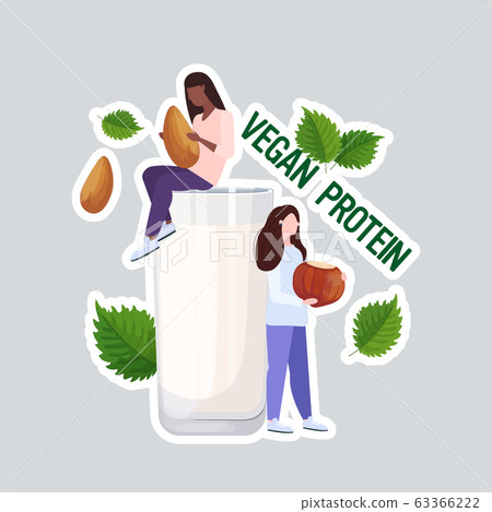 mix race girls drinking plant based almond hazelnut milk organic dairy free natural raw vegan protein full length mix race girls drinking plant based almond hazelnut milk organic dairy free natural raw vegan protein full length 63366222