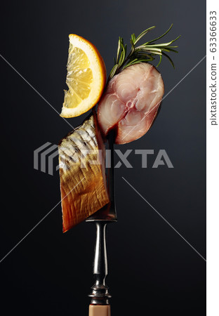Smoked mackerel with lemon and rosemary. Smoked mackerel with lemon and rosemary. 63366633