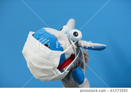 Donkey with mask Donkey with mask 63373895