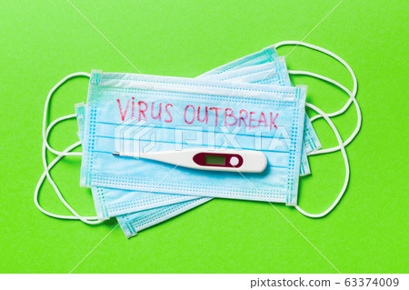 Top view of green background with virus outbreak 63374009