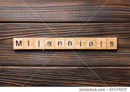 millennials word written on wood block. millennials word written on wood block. 63374037