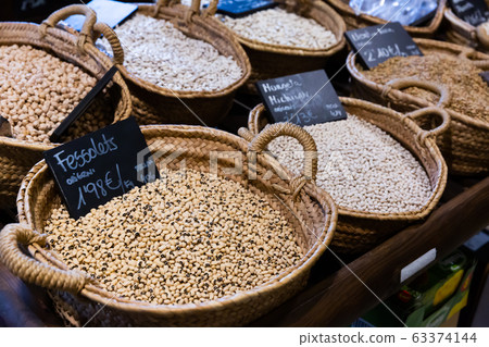 Dried pulses on grocery shop display Dried pulses on grocery shop display 63374144