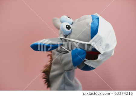 Donkey with mask Donkey with mask 63374216